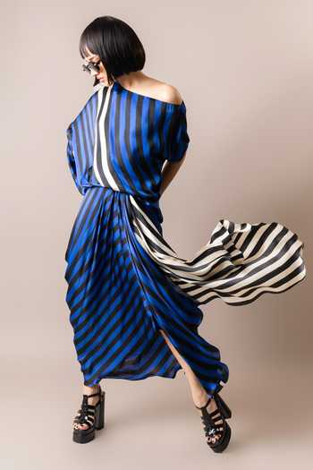 Nupur Kanoi_Multi Color Satin Scoop Neck One Shoulder Stripe Print Top And Cowl Skirt Set_at_Aza_Fashions