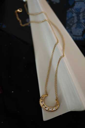 Shop Do Taara Gold Plated Crescent Kundan Embellished Pendant Necklace at Aza Fashions Shop_Do Taara_Gold Plated Crescent Kundan Embellished Pendant Necklace _at_Aza_Fashions