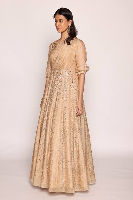Abstract By Megha Jain Madaan Beige Tissue, Cotton Piping, Beads Round Front Drape Embellished Panelled Dress Online at Aza Fashions Abstract By Megha Jain Madaan_Beige Tissue, Cotton Piping, Beads Round Front Drape Embellished Panelled Dress _Online_at_Aza_Fashions