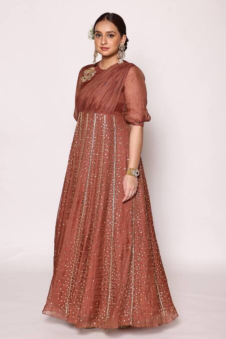 Abstract By Megha Jain Madaan Brown Tissue, Cotton Beads Round Neck 3d Fleur Embellished Panelled Maxi Dress at Aza Fashions Abstract By Megha Jain Madaan_Brown Tissue, Cotton Beads Round Neck 3d Fleur Embellished Panelled Maxi Dress _at_Aza_Fashions