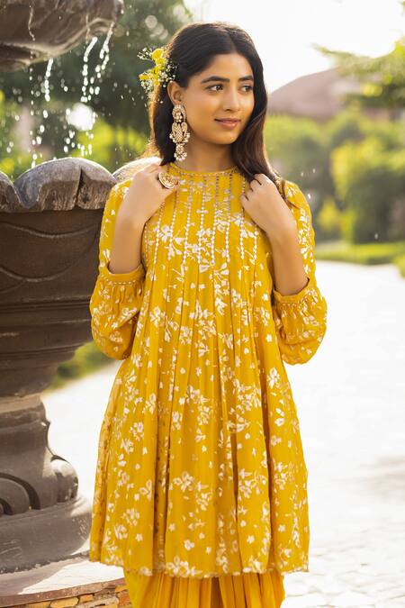 Shop Abstract By Megha Jain Madaan Yellow Georgette, Pansy Fleur Foil Print Pleated Flare Tunic With Dhoti Pant Online at Aza Fashions Shop_Abstract By Megha Jain Madaan_Yellow Georgette, Pansy Fleur Foil Print Pleated Flare Tunic With Dhoti Pant _Online_at_Aza_Fashions