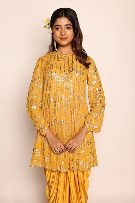 Abstract By Megha Jain Madaan Yellow Georgette, Pansy Fleur Foil Print Pleated Flare Tunic With Dhoti Pant at Aza Fashions Abstract By Megha Jain Madaan_Yellow Georgette, Pansy Fleur Foil Print Pleated Flare Tunic With Dhoti Pant _at_Aza_Fashions