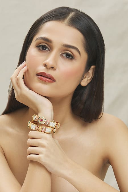 Buy Vivinia By Vidhi Mehra Gold Plated Smocking, Kundan Polki Embellished Temple Bangles - Set Of 2 Online at Aza Fashions Buy_Vivinia By Vidhi Mehra_Gold Plated Smocking, Kundan Polki Embellished Temple Bangles - Set Of 2 _Online_at_Aza_Fashions