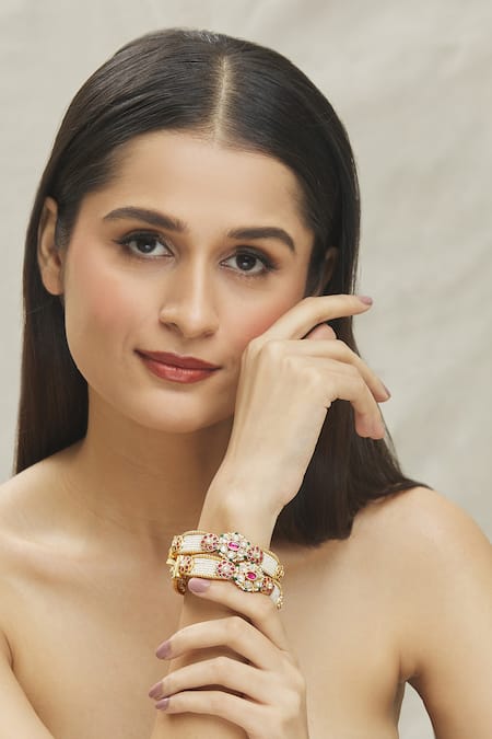 Vivinia By Vidhi Mehra Gold Plated Smocking, Kundan Polki Embellished Temple Bangles - Set Of 2 at Aza Fashions Vivinia By Vidhi Mehra_Gold Plated Smocking, Kundan Polki Embellished Temple Bangles - Set Of 2 _at_Aza_Fashions