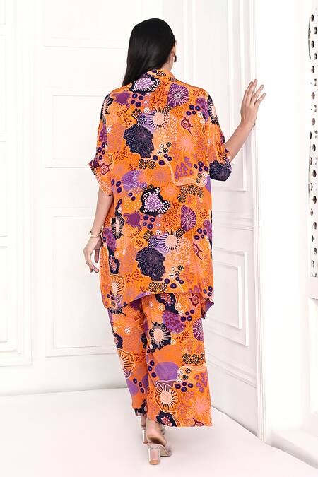 Shop Komal Shah Yellow Crepe Sequins Mandarin Collar Printed Tunic And Pant Set at Aza Fashions Shop_Komal Shah_Yellow Crepe Sequins Mandarin Collar Printed Tunic And Pant Set _at_Aza_Fashions