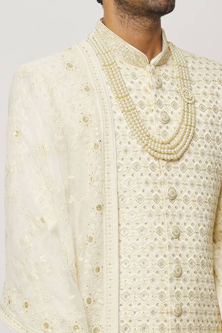 Shop_Arihant Rai Sinha_Cream Silk, Chiffon Crystals, Cut Geometric Embroidered Sherwani With Churidar _Online_at_Aza_Fashions