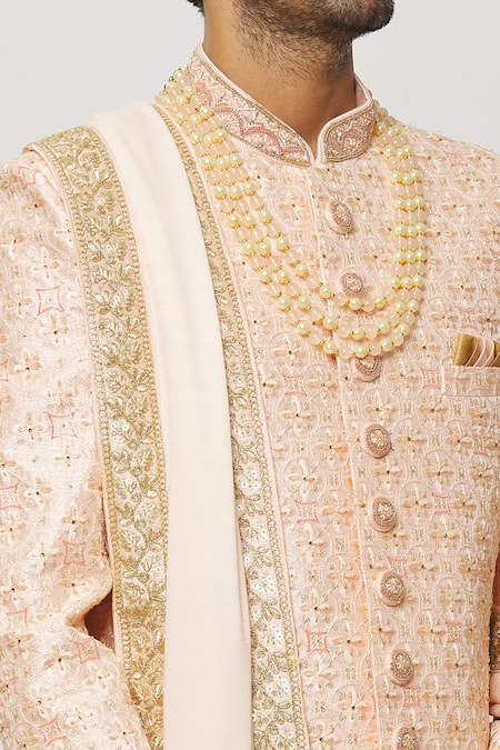Shop Arihant Rai Sinha Peach Silk, Cotton Crystals, Cut Blossom Embroidered Sherwani With Churidar Shop_Arihant Rai Sinha_Peach Silk, Cotton Crystals, Cut Blossom Embroidered Sherwani With Churidar