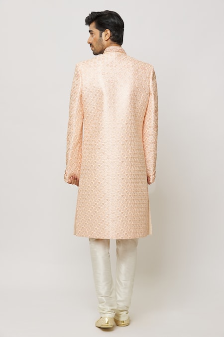 Shop Arihant Rai Sinha Peach Silk, Cotton Crystals, Cut Blossom Embroidered Sherwani With Churidar at Aza Fashions Shop_Arihant Rai Sinha_Peach Silk, Cotton Crystals, Cut Blossom Embroidered Sherwani With Churidar _at_Aza_Fashions