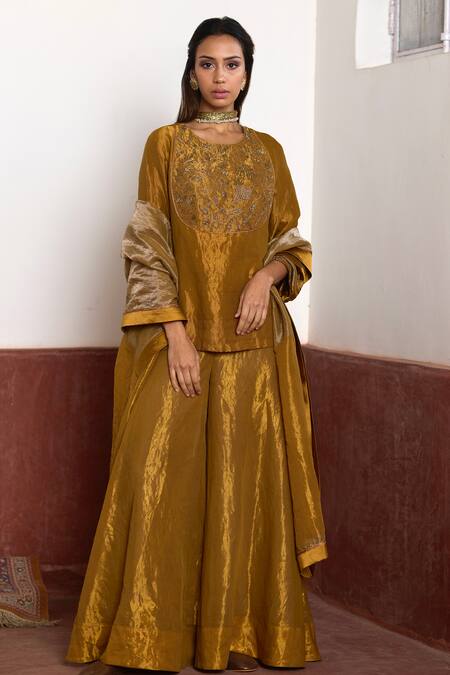Buy Shorshe Clothing Gold Tissue, Linen Zari, Embroidery Round Neck Short Kurta And Gharara Set Online at Aza Fashions Buy_Shorshe Clothing_Gold Tissue, Linen Zari, Embroidery Round Neck Short Kurta And Gharara Set _Online_at_Aza_Fashions