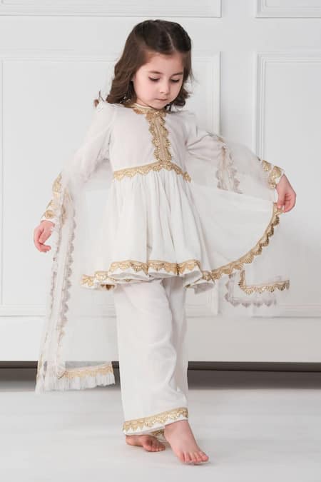 Shop The Pony & Peony Co. Ivory Velvet Gota Patti Embellished Kurta Pyjama Set at Aza Fashions Shop_The Pony & Peony Co._Ivory Velvet Gota Patti Embellished Kurta Pyjama Set _at_Aza_Fashions