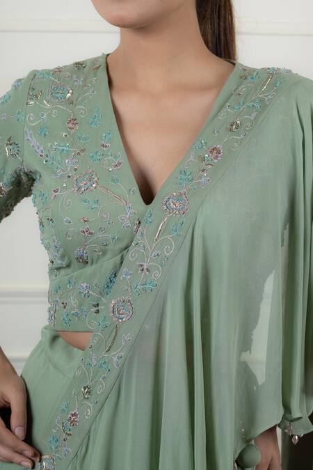 Buy House Of Mithi Kalra Green Georgette Sequins, Border Embroidered Pre-draped Lehenga Saree With Blouse Online at Aza Fashions Buy_House Of Mithi Kalra_Green Georgette Sequins, Border Embroidered Pre-draped Lehenga Saree With Blouse _Online_at_Aza_Fashions