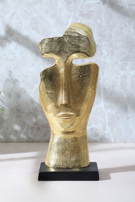 Buy Cocovey Homes Gold Aluminium Face Sculpture at Aza Fashions Buy_Cocovey Homes_Gold Aluminium Face Sculpture_at_Aza_Fashions