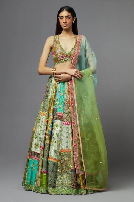Buy Aum By Asit And Ashima Green Silk Embroidered Floral Deep V Neck Blouse Lehenga Set Buy_Aum By Asit And Ashima_Green Silk Embroidered Floral Deep V Neck Blouse Lehenga Set