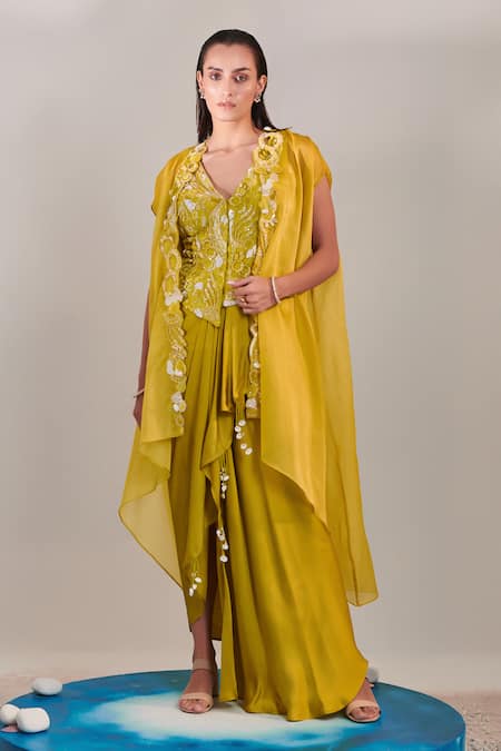 Shop One Knot One By Ashna Yellow , Satin Cut Work, Sequins Embroidered Asymmetric Cape Skirt Set at Aza Fashions Shop_One Knot One By Ashna_Yellow , Satin Cut Work, Sequins Embroidered Asymmetric Cape Skirt Set _at_Aza_Fashions