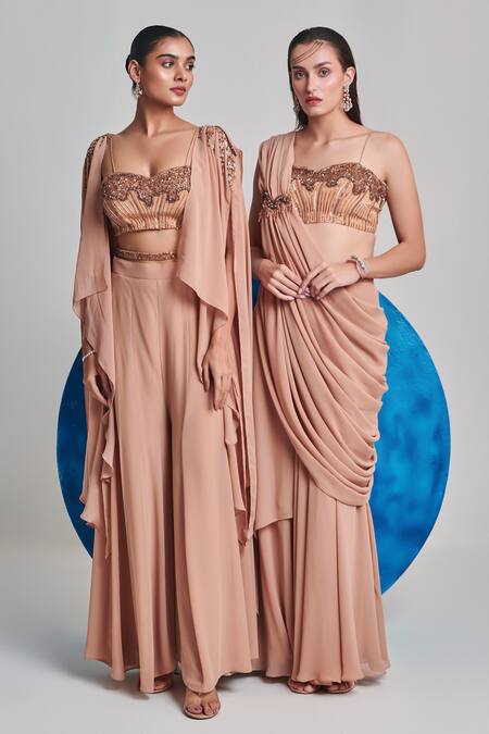 One Knot One By Ashna Beige Georgette Sequins, Cut Work Placed Applique Pre-draped Saree With Blouse at Aza Fashions One Knot One By Ashna_Beige Georgette Sequins, Cut Work Placed Applique Pre-draped Saree With Blouse _at_Aza_Fashions