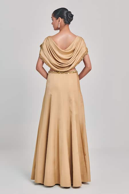 Shop One Knot One By Ashna Beige Crepe, Satin Sequins, Cut Work Round Embroidered Draped Blouse With Skirt at Aza Fashions Shop_One Knot One By Ashna_Beige Crepe, Satin Sequins, Cut Work Round Embroidered Draped Blouse With Skirt _at_Aza_Fashions