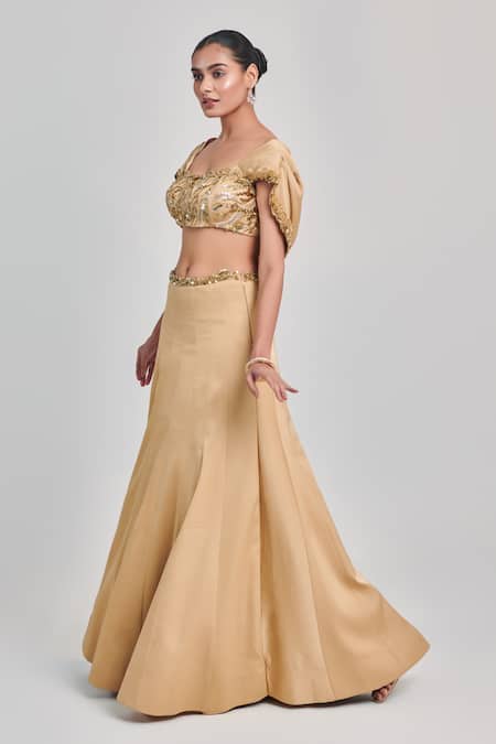 One Knot One By Ashna Beige Crepe, Satin Sequins, Cut Work Round Embroidered Draped Blouse With Skirt Online at Aza Fashions One Knot One By Ashna_Beige Crepe, Satin Sequins, Cut Work Round Embroidered Draped Blouse With Skirt _Online_at_Aza_Fashions