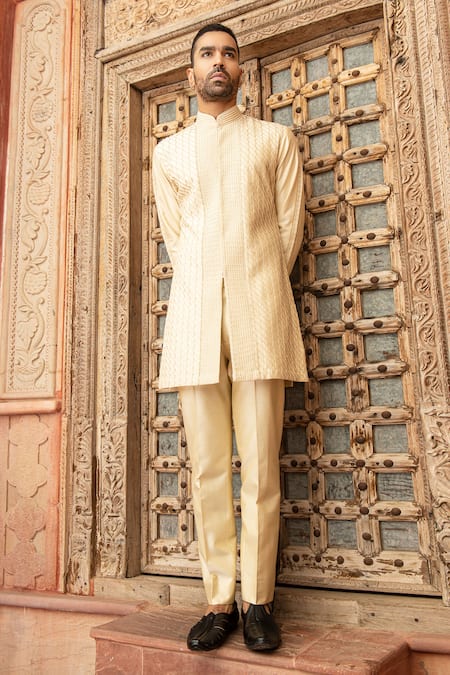 Shop Abkasa Beige Katan Silk Textured Pintucks Shimmerlyn Kurta And Pant Set at Aza Fashions Shop_Abkasa_Beige Katan Silk Textured Pintucks Shimmerlyn Kurta And Pant Set _at_Aza_Fashions