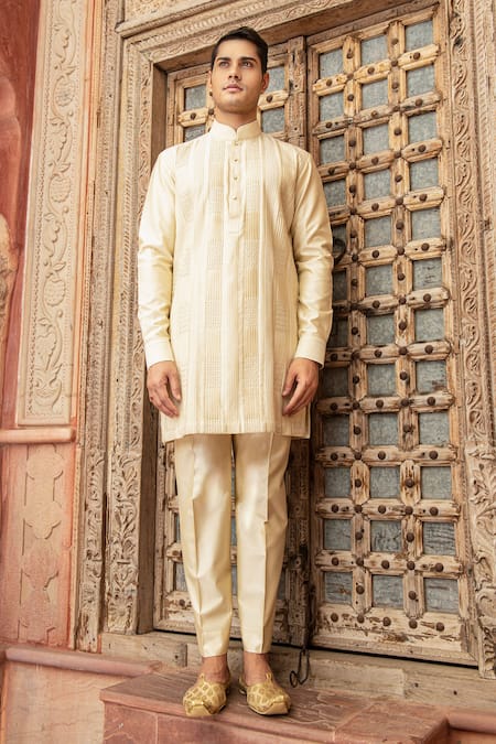 Shop Abkasa Beige Katan Silk Textured Pintucks Gildan Kurta And Pant Set at Aza Fashions Shop_Abkasa_Beige Katan Silk Textured Pintucks Gildan Kurta And Pant Set _at_Aza_Fashions