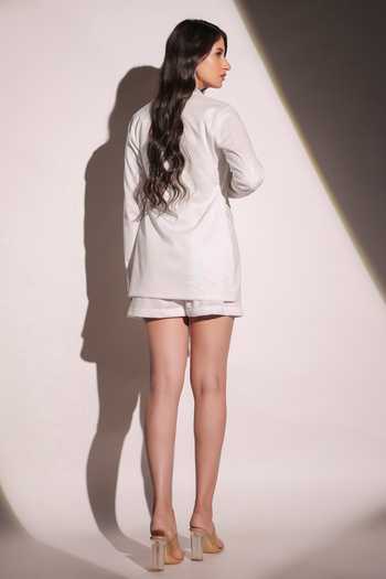 Shop B'Infinite White Shiny Lycra Woven Sequin Blazer Notched Lapel Pearl Shimmer Shorts Set at Aza Fashions Shop_B'Infinite_White Shiny Lycra Woven Sequin Blazer Notched Lapel Pearl Shimmer Shorts Set_at_Aza_Fashions