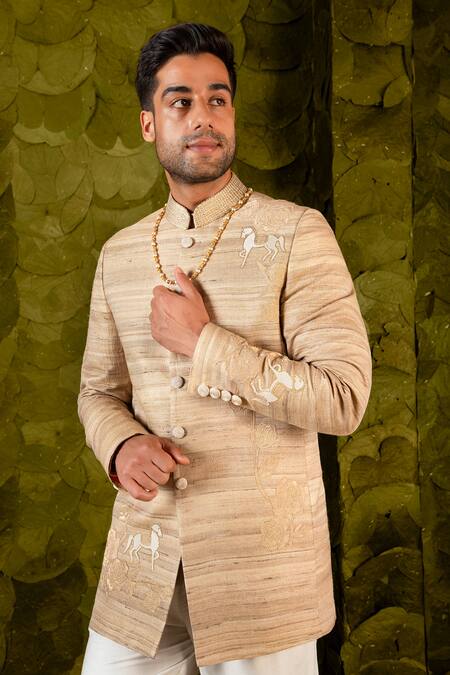 Latha Puttanna Beige Staple Tussar Hand Embroidered Aari Gold Gandu Horse Bandhgala Online at Aza Fashions Latha Puttanna_Beige Staple Tussar Hand Embroidered Aari Gold Gandu Horse Bandhgala _Online_at_Aza_Fashions