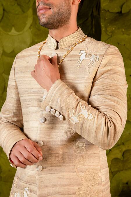 Shop Latha Puttanna Beige Staple Tussar Hand Embroidered Aari Gold Gandu Horse Bandhgala Online at Aza Fashions Shop_Latha Puttanna_Beige Staple Tussar Hand Embroidered Aari Gold Gandu Horse Bandhgala _Online_at_Aza_Fashions