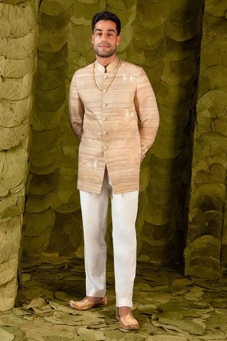 Latha Puttanna Beige Staple Tussar Hand Embroidered Aari Gold Gandu Horse Bandhgala at Aza Fashions Latha Puttanna_Beige Staple Tussar Hand Embroidered Aari Gold Gandu Horse Bandhgala _at_Aza_Fashions