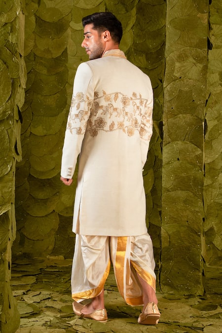 Shop_Latha Puttanna_Cream Matka Silk Hand Embroidered Aari Gold Beaten Gandu Horse Sherwani _at_Aza_Fashions