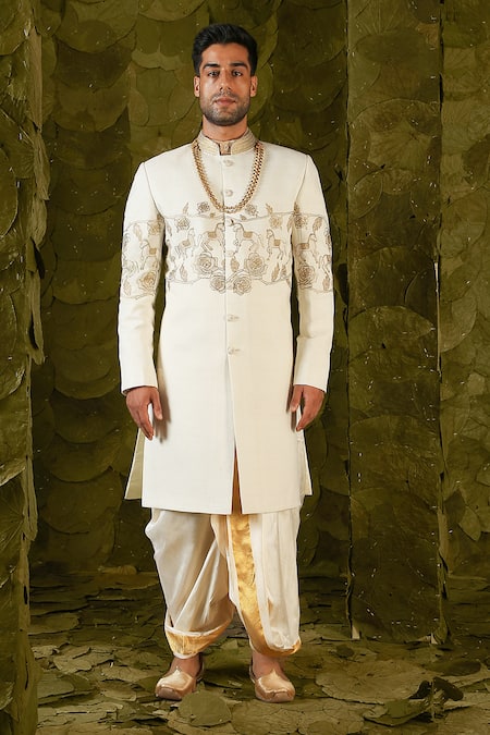 Latha Puttanna_Cream Matka Silk Hand Embroidered Aari Gold Beaten Gandu Horse Sherwani _at_Aza_Fashions