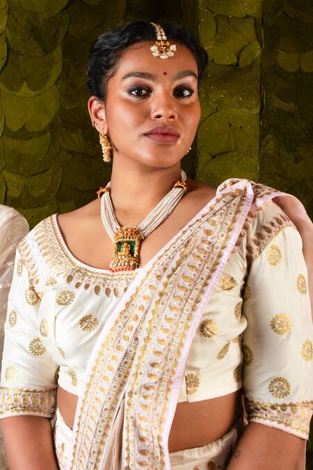 Latha Puttanna White Karnataka Silk Embroidered Aari Round Hennu Tape Bridal Lehenga Set at Aza Fashions Latha Puttanna_White Karnataka Silk Embroidered Aari Round Hennu Tape Bridal Lehenga Set _at_Aza_Fashions