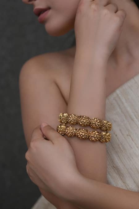 Do Taara Gold Embossed Temple Bangles Set 