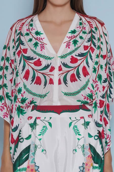 Limerick By Abirr N' Nanki White Crepe Sequins, Embroidery V-neck Tulip Print Top Online at Aza Fashions Limerick By Abirr N' Nanki_White Crepe Sequins, Embroidery V-neck Tulip Print Top _Online_at_Aza_Fashions