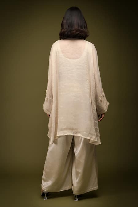 Shop Farha Syed Ivory Georgette, Taffeta, Muslin Cutdana Embroidered Placement Kaftan Pant Set at Aza Fashions Shop_Farha Syed_Ivory Georgette, Taffeta, Muslin Cutdana Embroidered Placement Kaftan Pant Set _at_Aza_Fashions