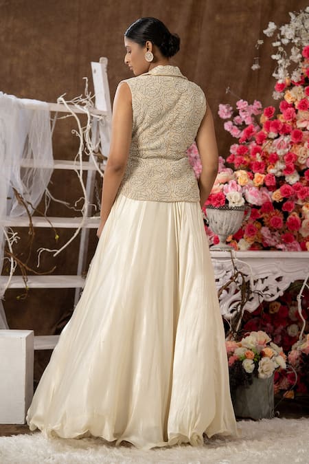 Shop Farha Syed Ivory Modal And Chanderi Embroidered Cutdana Floral Jacket & Flared Skirt Set at Aza Fashions Shop_Farha Syed_Ivory Modal And Chanderi Embroidered Cutdana Floral Jacket & Flared Skirt Set _at_Aza_Fashions
