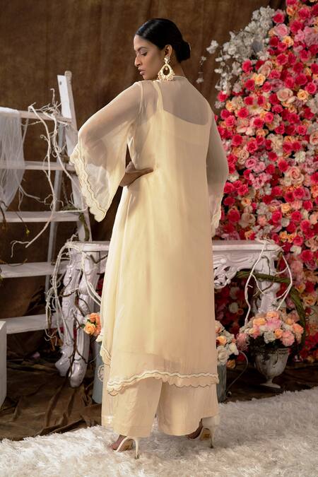 Shop Farha Syed Ivory Modal, Taffeta, Organza Cut Work, Floral Cutdana And Kurta & Palazzo Set at Aza Fashions Shop_Farha Syed_Ivory Modal, Taffeta, Organza Cut Work, Floral Cutdana And Kurta & Palazzo Set _at_Aza_Fashions