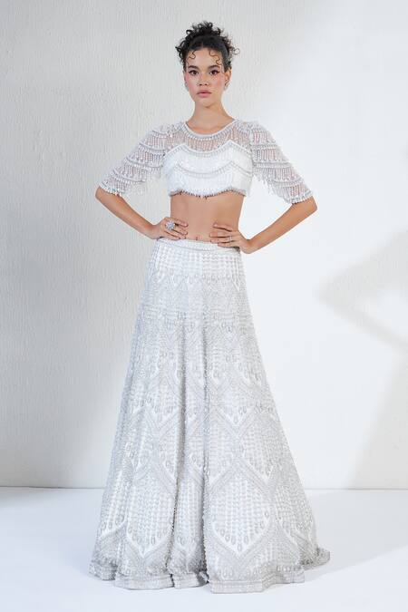 Ridhimaa Gupta White Net Beads, Crystals Round Neck Celeste Embellished Bridal Lehenga Set Online at Aza Fashions Ridhimaa Gupta_White Net Beads, Crystals Round Neck Celeste Embellished Bridal Lehenga Set _Online_at_Aza_Fashions