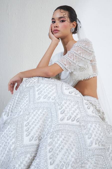 Ridhimaa Gupta White Net Beads, Crystals Round Neck Celeste Embellished Bridal Lehenga Set at Aza Fashions Ridhimaa Gupta_White Net Beads, Crystals Round Neck Celeste Embellished Bridal Lehenga Set _at_Aza_Fashions