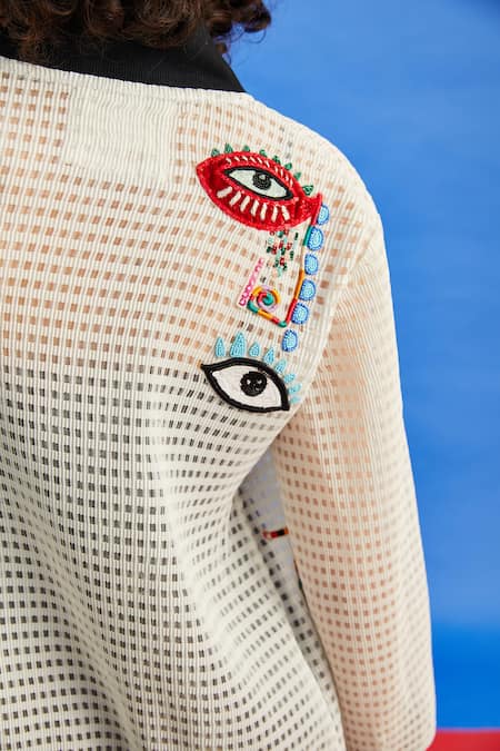 Buy_Shilpi Gupta_White Crepe Sequins, Beads, Embroidery High Evil Eye Applique Bomber Jacket _Online_at_Aza_Fashions