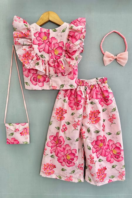 Shop Label Neeti Pink Linen, Cotton Bows Flora Print Top And Palazzo Set at Aza Fashions Shop_Label Neeti_Pink Linen, Cotton Bows Flora Print Top And Palazzo Set _at_Aza_Fashions