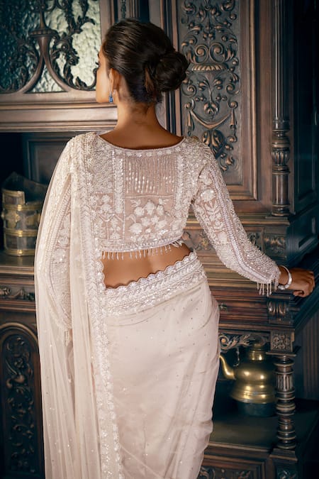 Shop_Seema Gujral_Beige Net Sequins, Crystals, Tassels Plunge Neck Embroidered Saree Set _at_Aza_Fashions