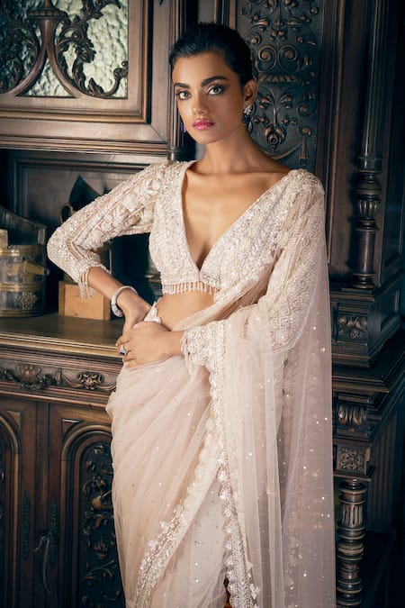 Seema Gujral_Beige Net Sequins, Crystals, Tassels Plunge Neck Embroidered Saree Set _Online_at_Aza_Fashions