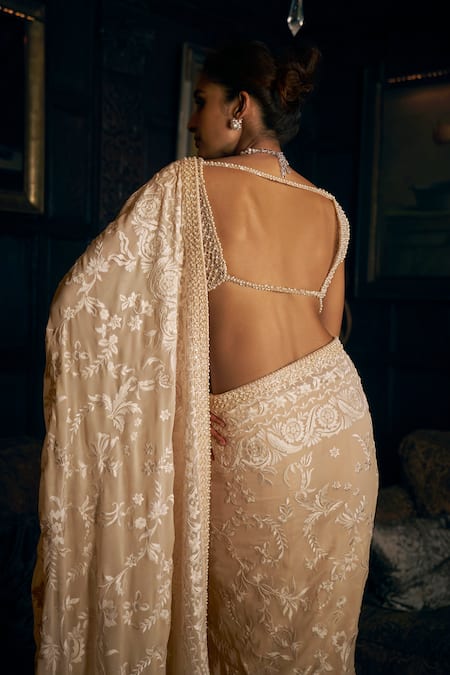Shop_Seema Gujral_Beige Georgette Pearls, Embroidery Plunge Neck Saree Set _at_Aza_Fashions