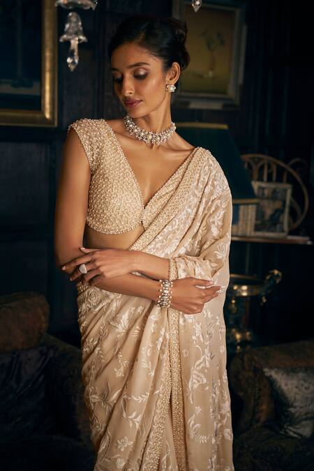 Seema Gujral_Beige Georgette Pearls, Embroidery Plunge Neck Saree Set _Online_at_Aza_Fashions