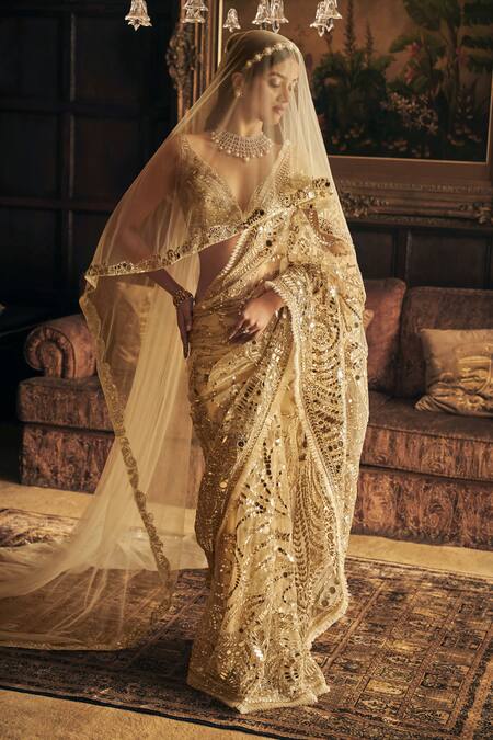 Seema Gujral_Cream Net Crystals, Mirrors, Sequins Plunge Neck Embroidered Saree With Blouse _Online_at_Aza_Fashions