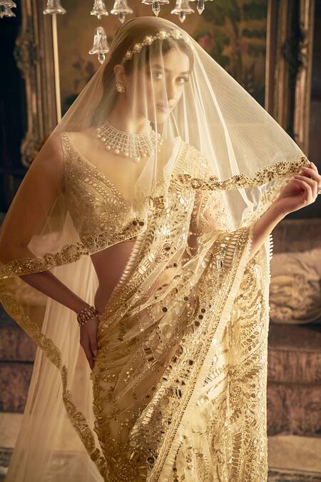 Buy_Seema Gujral_Cream Net Crystals, Mirrors, Sequins Plunge Neck Embroidered Saree With Blouse _Online_at_Aza_Fashions