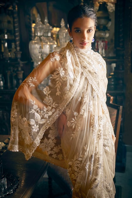 Seema Gujral_Beige Net Sequins, Crystals, Metallic Floral Applique Saree With Blouse _at_Aza_Fashions