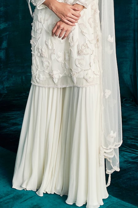Kashmiraa Ivory Organza, Georgette Beads, Pearls Floral Embroidered Kurta Sharara Set Online at Aza Fashions Kashmiraa_Ivory Organza, Georgette Beads, Pearls Floral Embroidered Kurta Sharara Set _Online_at_Aza_Fashions