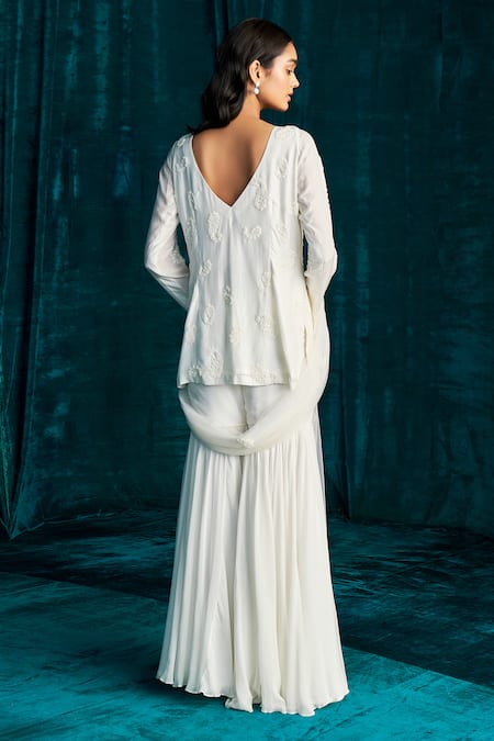 Shop Kashmiraa Ivory Georgette Embroidery, Cut Work, Sequins Paisley Dana Kurta Sharara Set at Aza Fashions Shop_Kashmiraa_Ivory Georgette Embroidery, Cut Work, Sequins Paisley Dana Kurta Sharara Set _at_Aza_Fashions