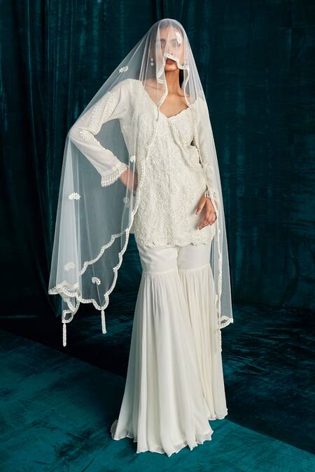 Shop Kashmiraa Ivory Georgette Embroidery, Cut Work, Sequins Paisley Dana Kurta Sharara Set Online at Aza Fashions Shop_Kashmiraa_Ivory Georgette Embroidery, Cut Work, Sequins Paisley Dana Kurta Sharara Set _Online_at_Aza_Fashions