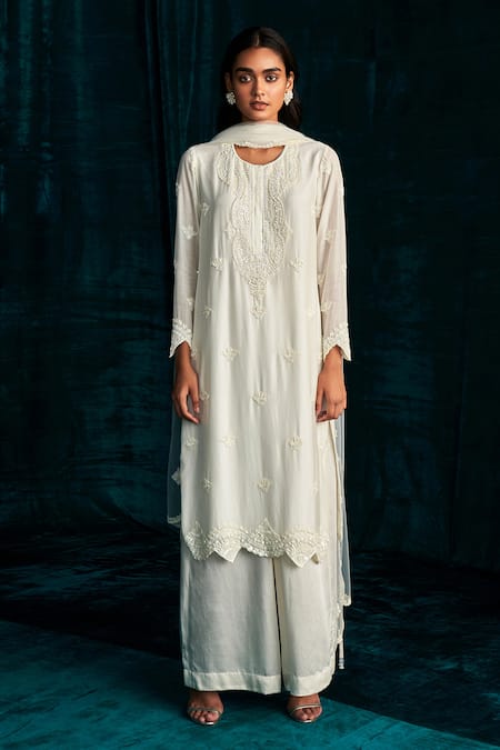 Buy Kashmiraa Ivory Georgette Embroidery, Cut Work, Sequins V-neck Dana Kurta Palazzo Set Online at Aza Fashions Buy_Kashmiraa_Ivory Georgette Embroidery, Cut Work, Sequins V-neck Dana Kurta Palazzo Set _Online_at_Aza_Fashions